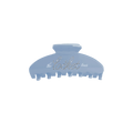 Blue hair clip with Madison Beer's 'the locket tour' branding.